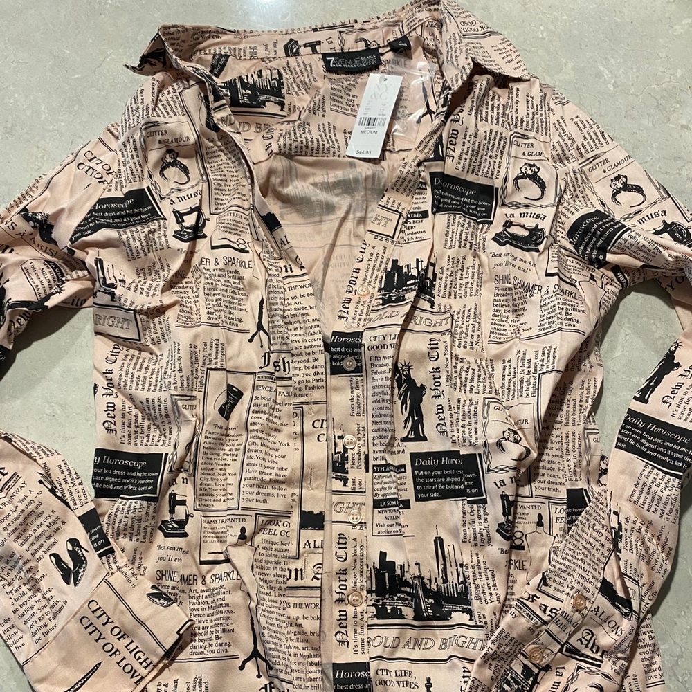 Newspaper print blouse